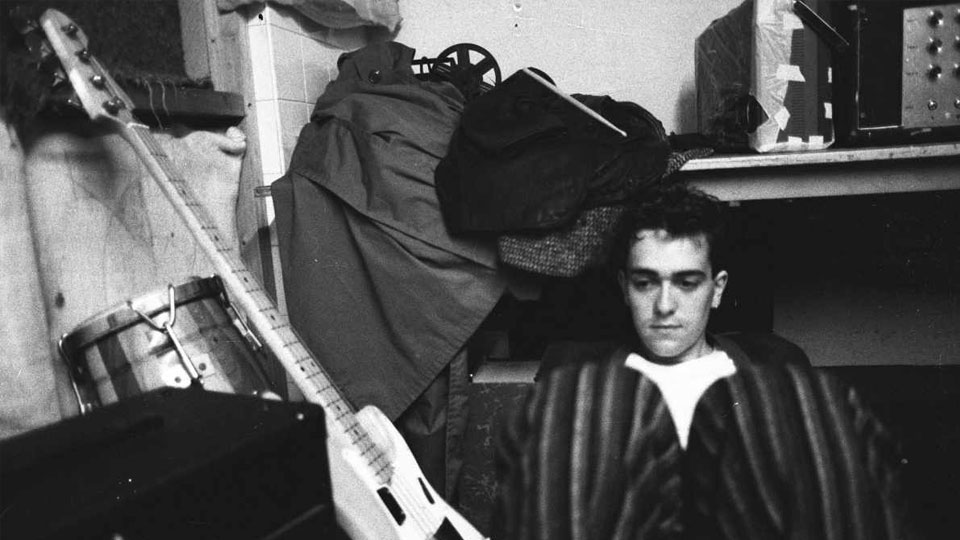 Fellow fine art student and Smart Cookies bass player Bob Smith (AKA Bobby Valentine) takes time out between takes